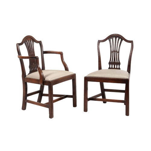 774 - A set of eight George III Hepplewhite style dining chairs, two carvers, the drop in seats on moulded... 