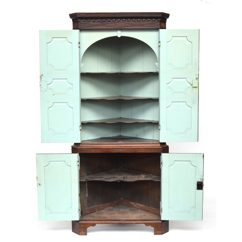 794 - A George III oak standing corner cupboard, approx. 95cm wide, 213cm high