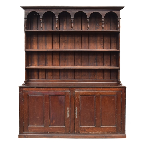 799 - A 19th century and later stained pine Welsh dresser, the later rack by R.A. Bragg, c.1987 (bears lab... 