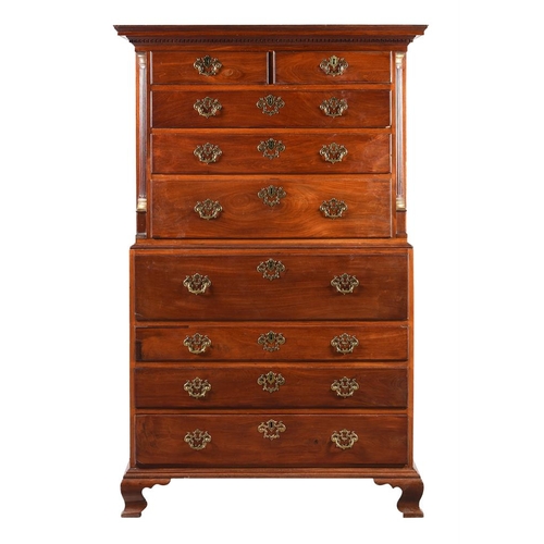 803 - A George III mahogany and parcel gilt chest on chest, c.1770, the dentil cornice over two short and ... 