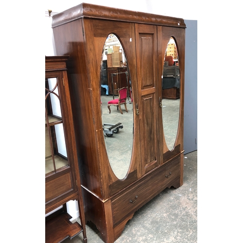 791 - A 20th century mahogany hanging wardrobe with mirrored doors, drawer below, 123x46x194cmH