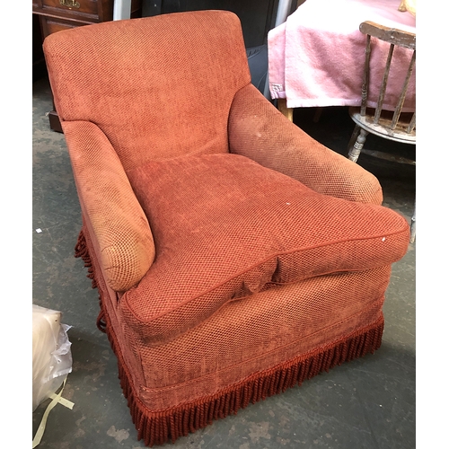 750 - A generous 20th century Howard style armchair upholstered in brick fabric, 76cm wide, 102cm deep