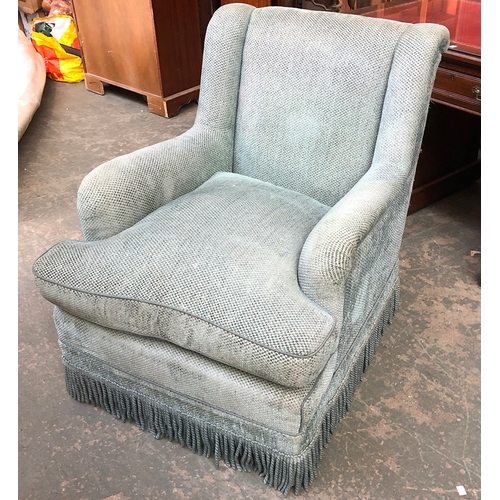 751 - A large armchair with brass casters, 74cmW