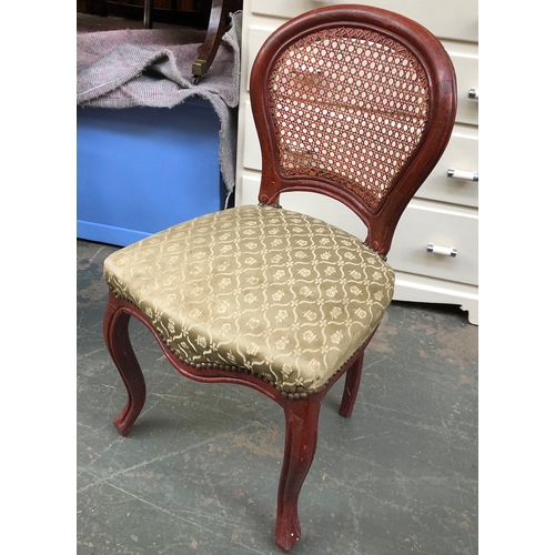 759 - An ash spindleback rocking chair with rush seat; together with a red stained occasional chair, with ... 