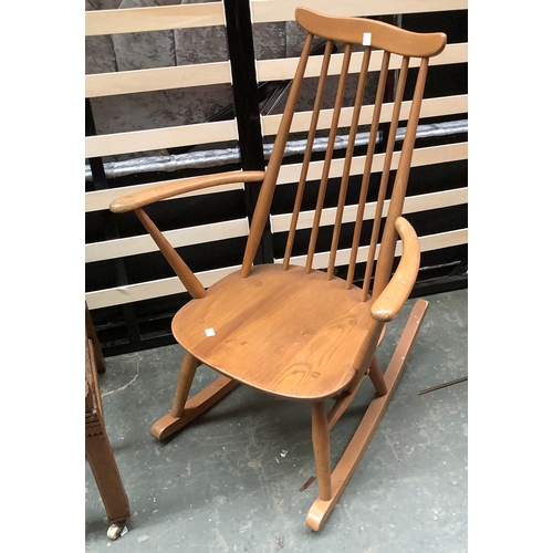 784 - An Ercol elm and beech stickback rocking chair, 62cmW