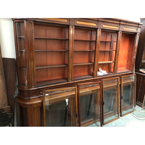 796 - A magnificent Victorian apothecary cabinet, c.1860, the top and base each with four glazed doors, wi... 