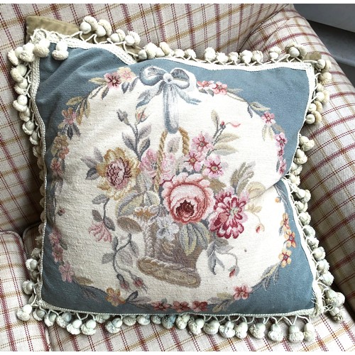 773A - A needlework cushion with floral design