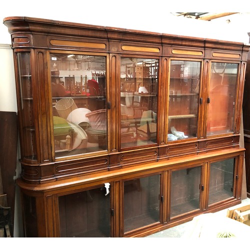 796 - A magnificent Victorian apothecary cabinet, c.1860, the top and base each with four glazed doors, wi... 