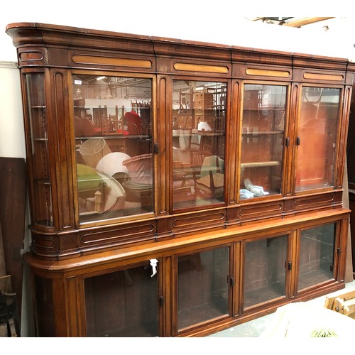 796 - A magnificent Victorian apothecary cabinet, c.1860, the top and base each with four glazed doors, wi... 