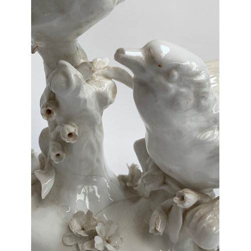 86 - A collection of four Crown Staffordshire white glaze bird figurines, modelled by G.T Jones, two af, ... 