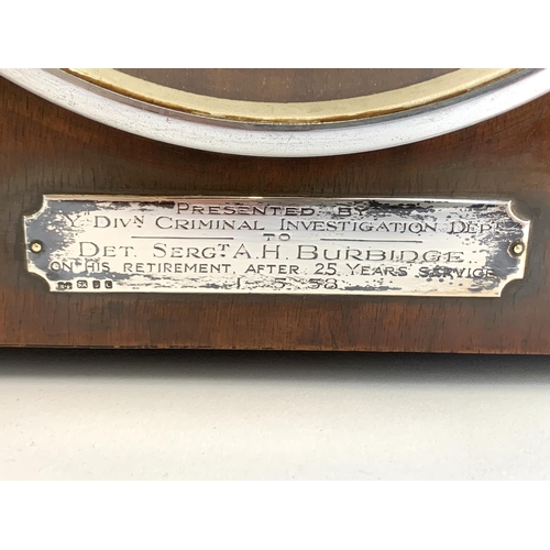 77 - A 1950s oak cased mantel clock, bearing silver presentation plaque engraved 'Presented by Y Divn. Cr... 