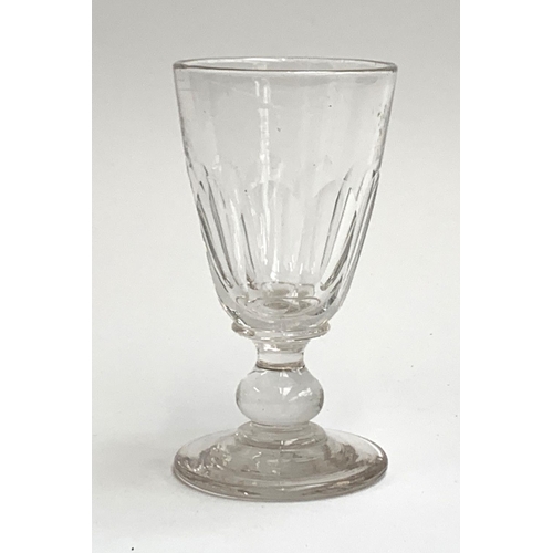 97 - A heavy Georgian wine glass, knopped stem on a slightly domed circular foot, 15.5cmH