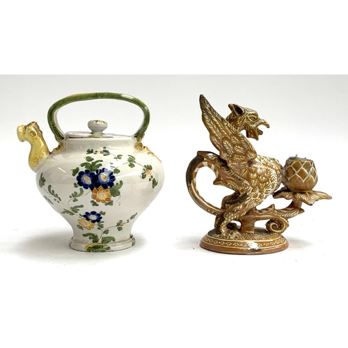 111 - An Italian Cantagalli majolica teapot, with serpent form spout, hand painted with a spray of flowers... 