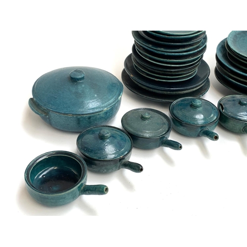 113 - Approx. 32 pieces of 'Delhi Blue' glazed pottery, including plates, a tureen, and handled lidded bow... 