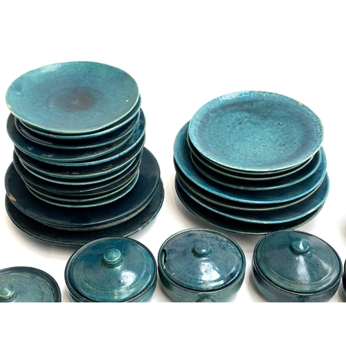 113 - Approx. 32 pieces of 'Delhi Blue' glazed pottery, including plates, a tureen, and handled lidded bow... 