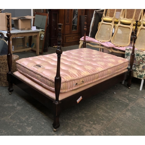 845 - A 20th century American double bed, four baluster turned posts capped with gilt swans, 138cmW