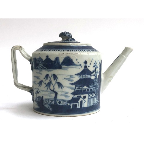 120 - A Chinese export blue and white teapot of cylindrical form with entwined bifurcated handle, repairs ... 