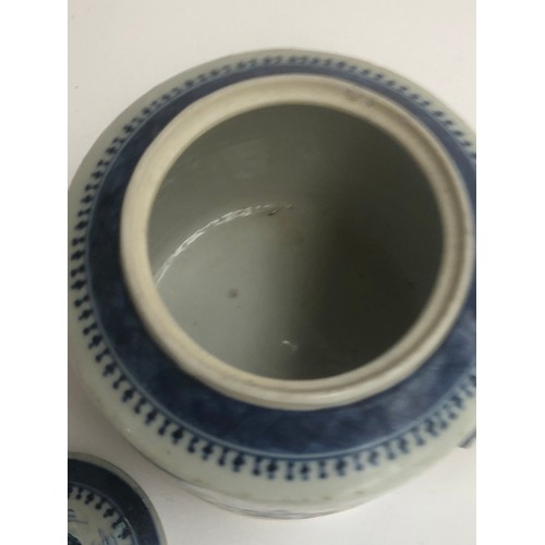 120 - A Chinese export blue and white teapot of cylindrical form with entwined bifurcated handle, repairs ... 