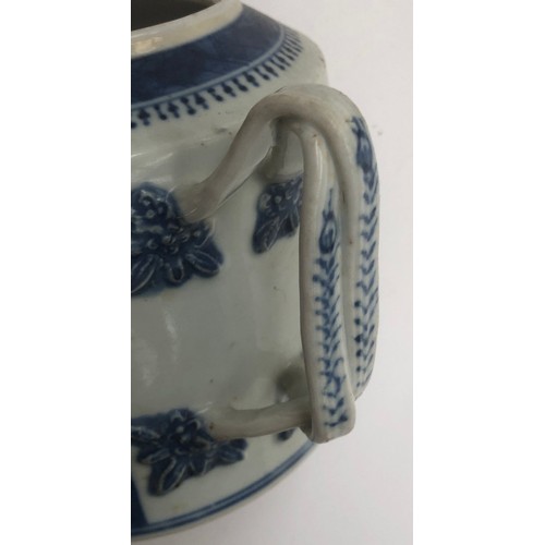 120 - A Chinese export blue and white teapot of cylindrical form with entwined bifurcated handle, repairs ... 