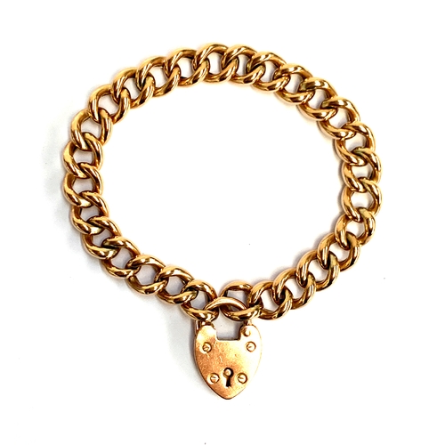 A 9ct gold curb link bracelet with padlock clasp, approx. 12.5g