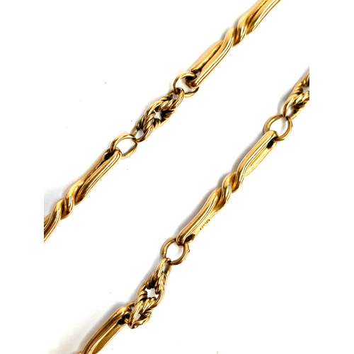 33 - A 9ct gold fancy link chain, 42.5cm long unclasped length, missing one link, 17.6g