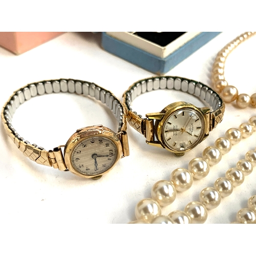 38 - A 9ct gold cased ladies cocktail watch; together with a ladies Rotary 21 Jewels automatic cocktail w... 