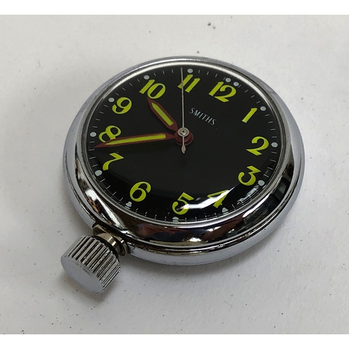 75 - A Smiths 'Rally' watch, black dial with yellow Arabic numerals, magnetic back for attachment to a da... 