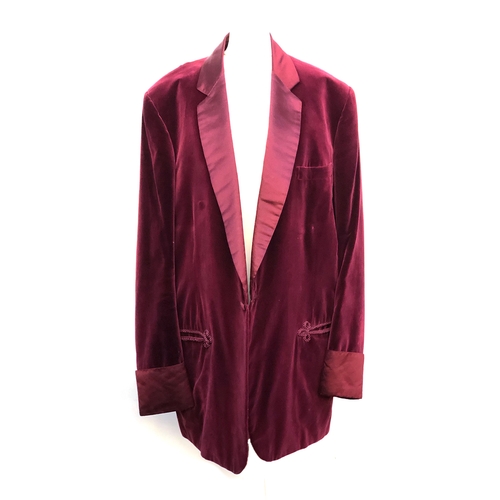 531 - A Denman & Goddard single breasted dinner jacket, in maroon velvet, with turned cuffs and ropetwist ... 