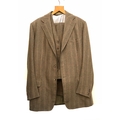 A Denman & Goddard three piece brown tweed suit c.1975, the trousers ...