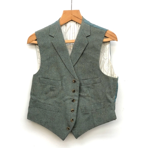 548 - Scottish interest: a Meyer & Mortimer tweed cutaway jacket and waistcoat, with kilt, the jacket appr... 