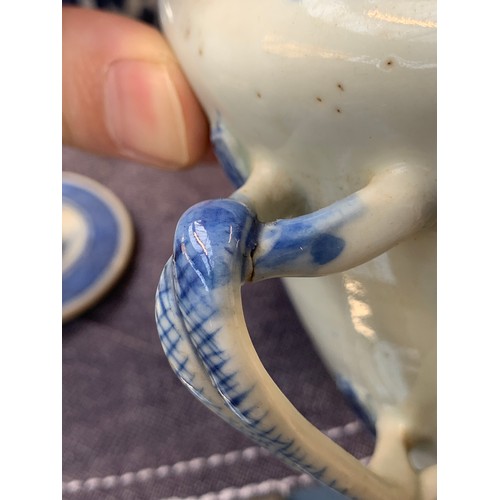 121 - A small Chinese export blue and white teapot, entwined bifurcated handle, 11.5cmH; together with a s... 