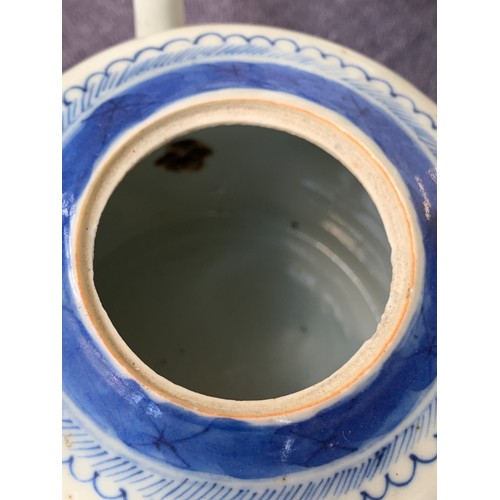 121 - A small Chinese export blue and white teapot, entwined bifurcated handle, 11.5cmH; together with a s... 