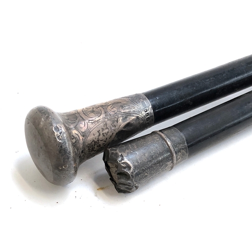 75 - A Victorian silver topped ebonised walking cane, hallmarked for London 1873, 91cmL; together with a ... 