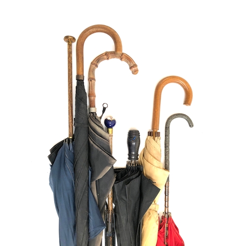 82 - A mixed lot of vintage umbrellas (some af), one with chased white metal handle, one art deco with pa... 