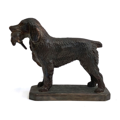 130 - Louis LeJeune - A bronze metal car mascot of a Springer Spaniel carrying a pheasant, marked LE to ba... 