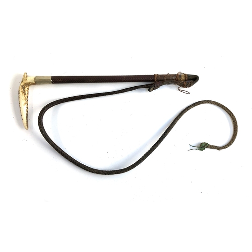 95 - A Swaine gents hunting whip, antler handle, leather thong, the shaft51cmL