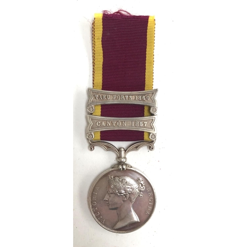 986 - A Second China War medal with Taku Forts 1860 and Canton 1857 clasps, unnamed