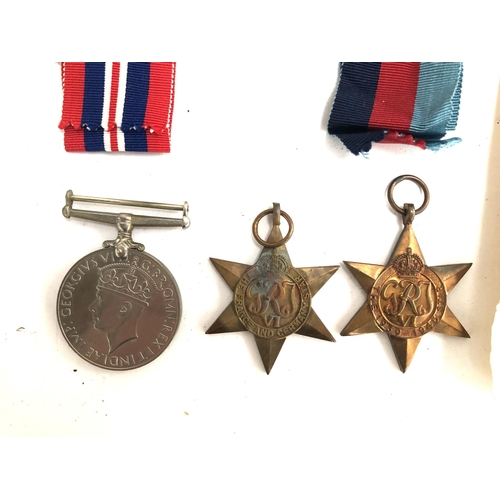 987 - A WWII France and Germany star, together with a 1939-45 star and a war medal, all unnamed but appear... 