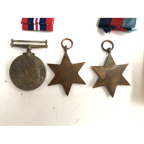 987 - A WWII France and Germany star, together with a 1939-45 star and a war medal, all unnamed but appear... 