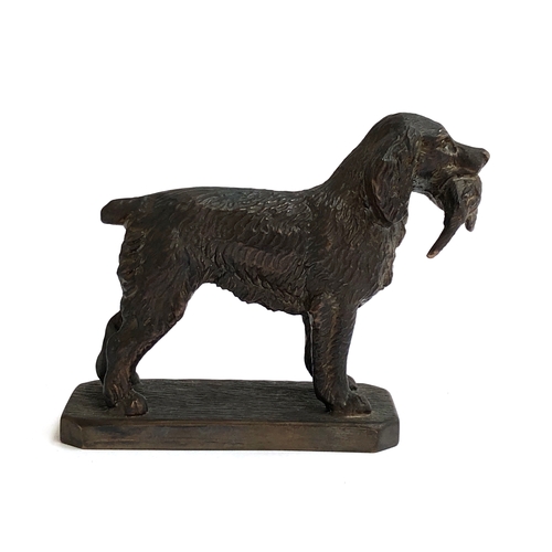 130 - Louis LeJeune - A bronze metal car mascot of a Springer Spaniel carrying a pheasant, marked LE to ba... 