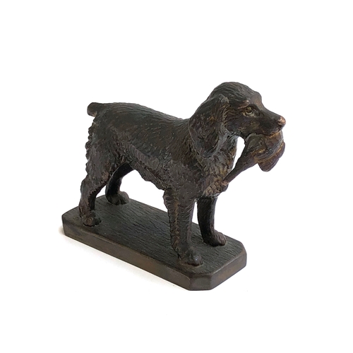 130 - Louis LeJeune - A bronze metal car mascot of a Springer Spaniel carrying a pheasant, marked LE to ba... 