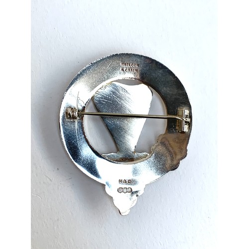 40A - A Scottish silver Clan Rose brooch, bearing the motto 'Constant and True' and a harp crest, hallmark... 