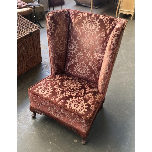 1635 - A 20th century low wingback armchair