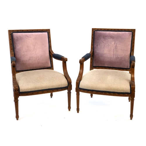 1649 - A pair of Louis XVI style open armchairs, square upholstered backs, stuffover seats raised on fluted... 