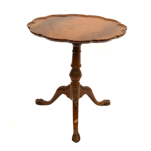 1654 - A George III style tripod table, shaped tip top raised on a turned and carved column and tripod cabr... 