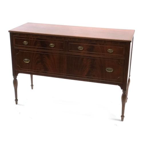 1658 - A reproduction sideboard by Dauler Close Furniture Co., three drawers, raised on fluted legs, 137cm ... 