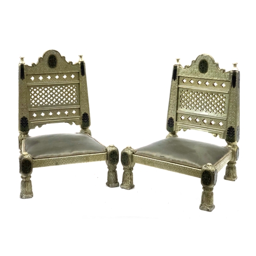 1673 - A pair of Indian worked sheet metal chairs, domed and pierced backs over low upholstered seats, 60cm... 