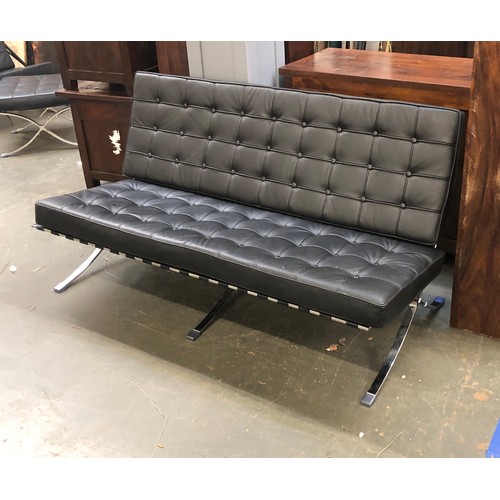 1688 - A Barcelona style crossframe chrome and black vinyl settee, 150cmW