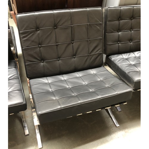 1690 - A Barcelona style crossframe chrome and black vinyl seat, 77cmW