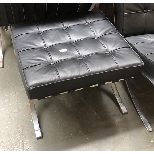 1691 - A Barcelona style crossframe chrome and black vinyl footstool, 62x56x42cmH